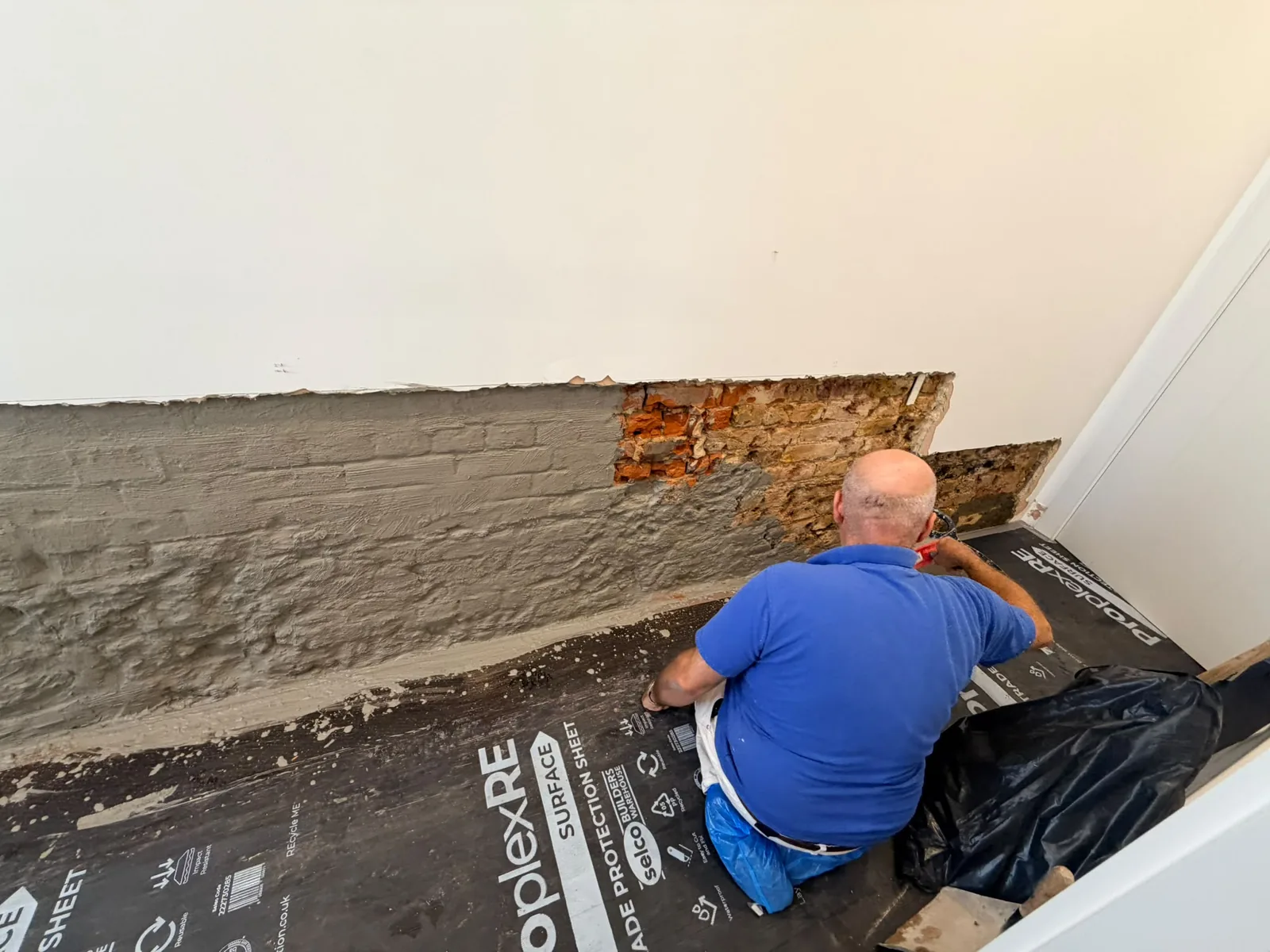 Damp treatment in progress with wall finishes removed